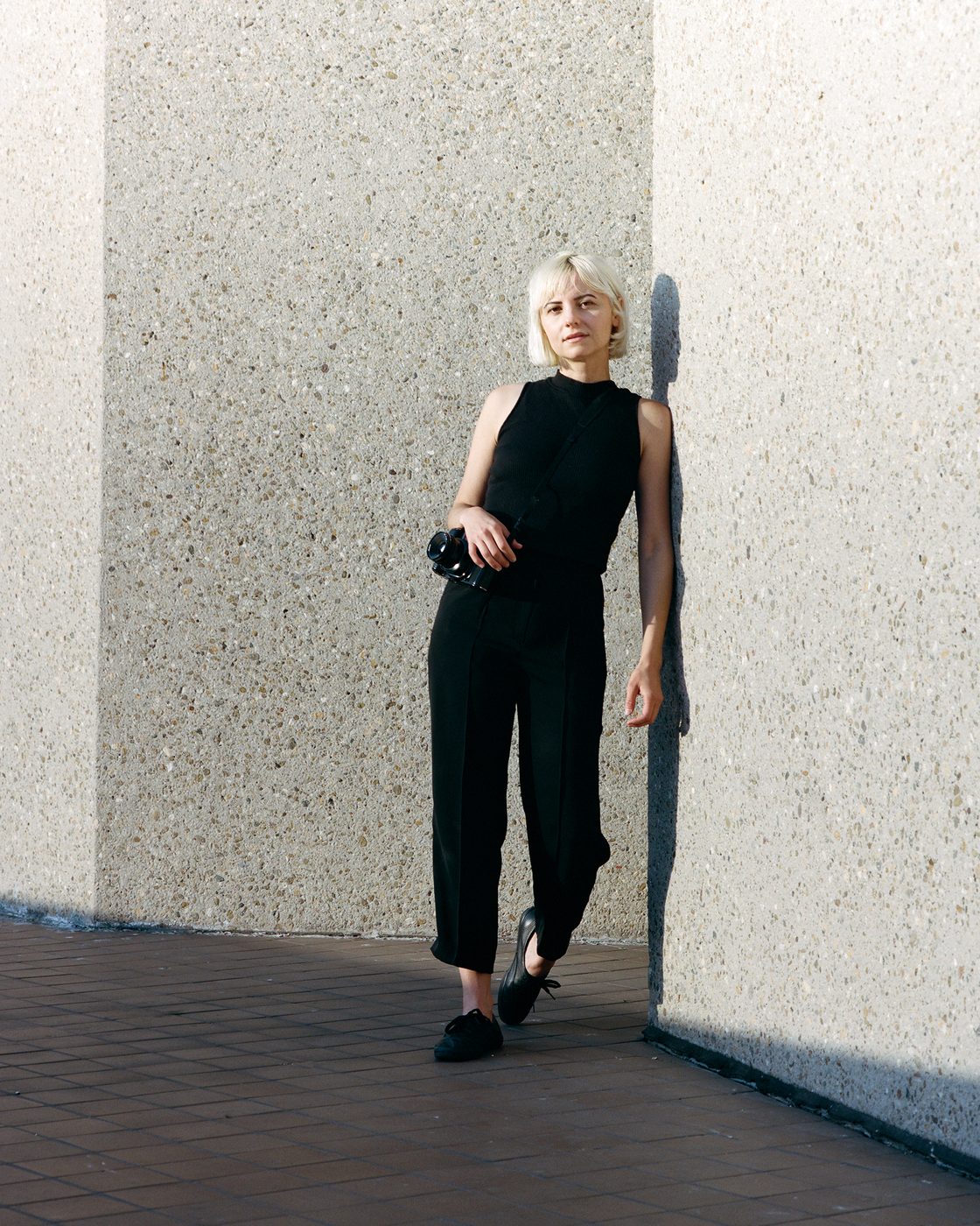 Sinziana Velicescu, architectural photographer, with a medium format camera