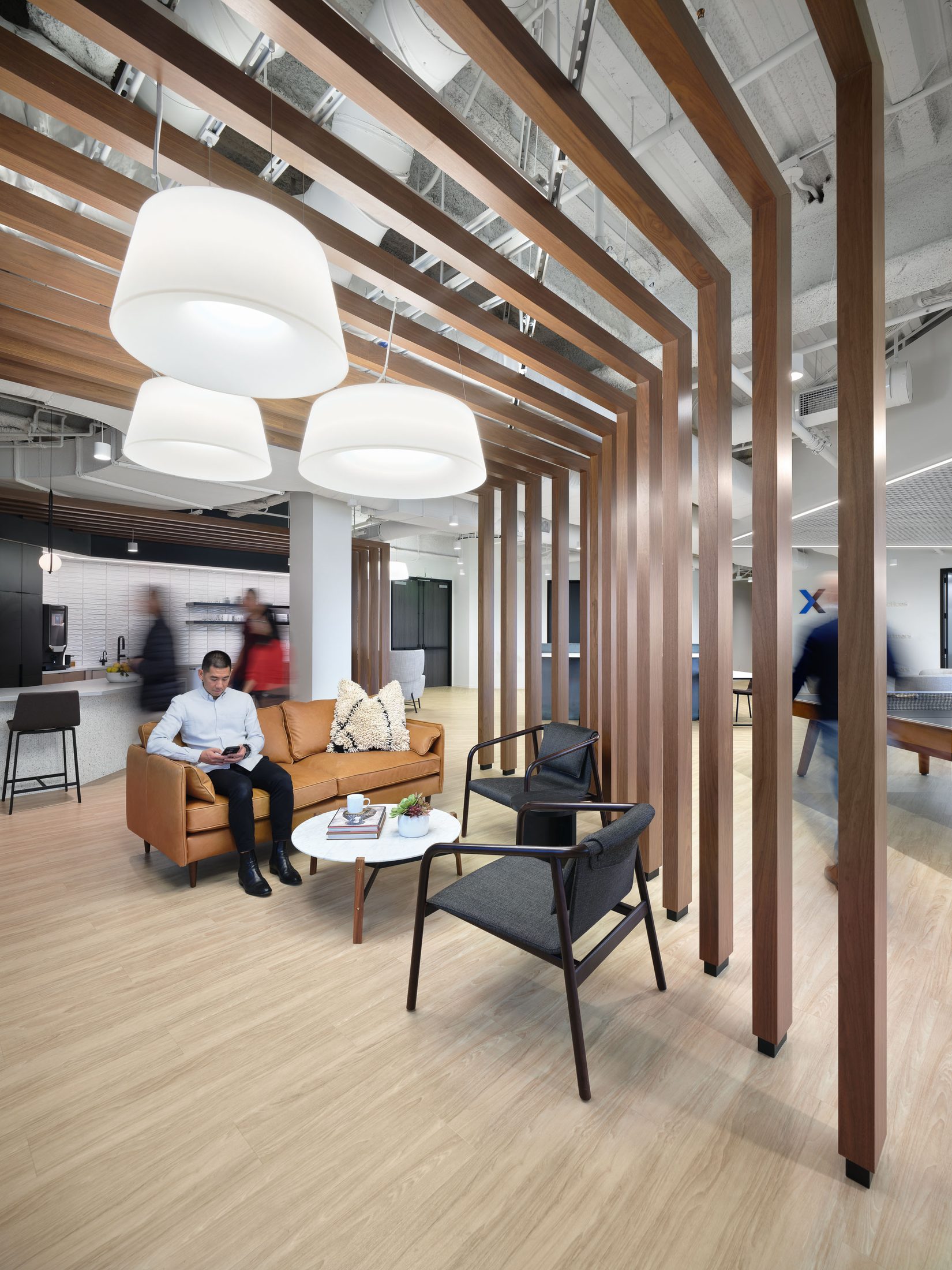 DentalXchange, lounge behind wood fin screen